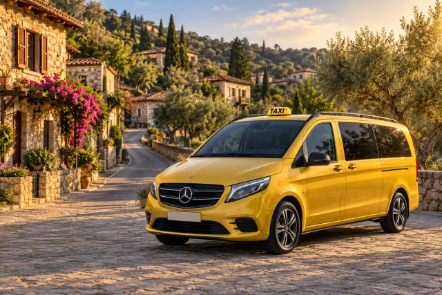 Yellow taxi on a village road illustrating taxi transportation from Kusadasi to Sirince